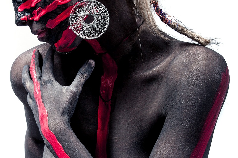 girl holding her upper chest